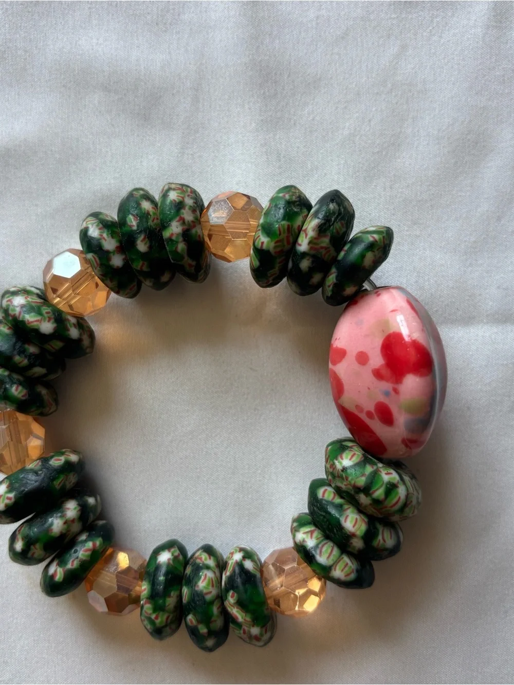 Green Millefiori Bead Stretch Bracelet with Pink Accent